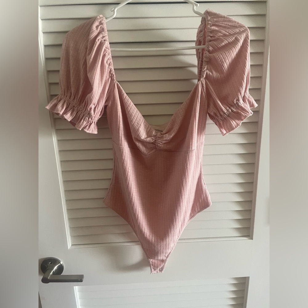 Peach body suit
